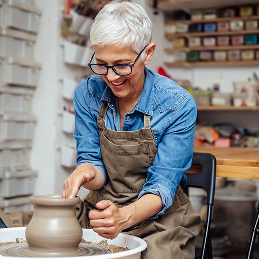 Woman smiling during ceramics class