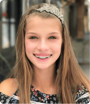 girl smiling after treatment